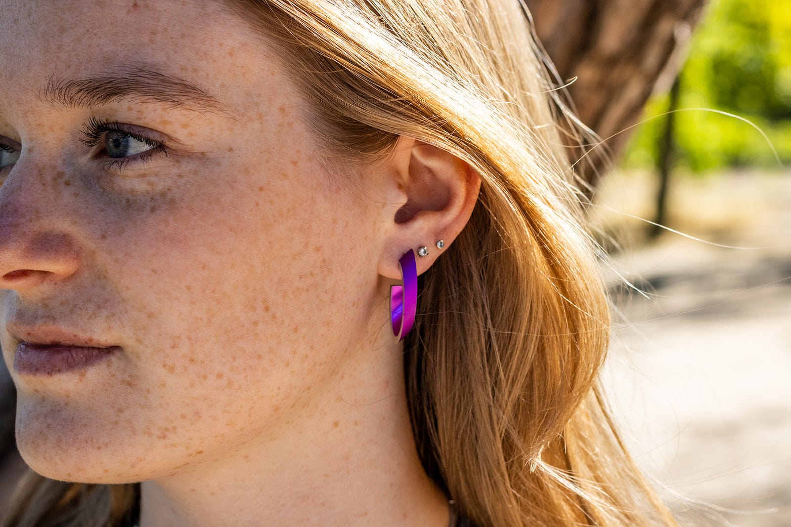 OLIVIA purple earrings worn | oval hoop earrings with a matte finish | CLIC by Suzanne