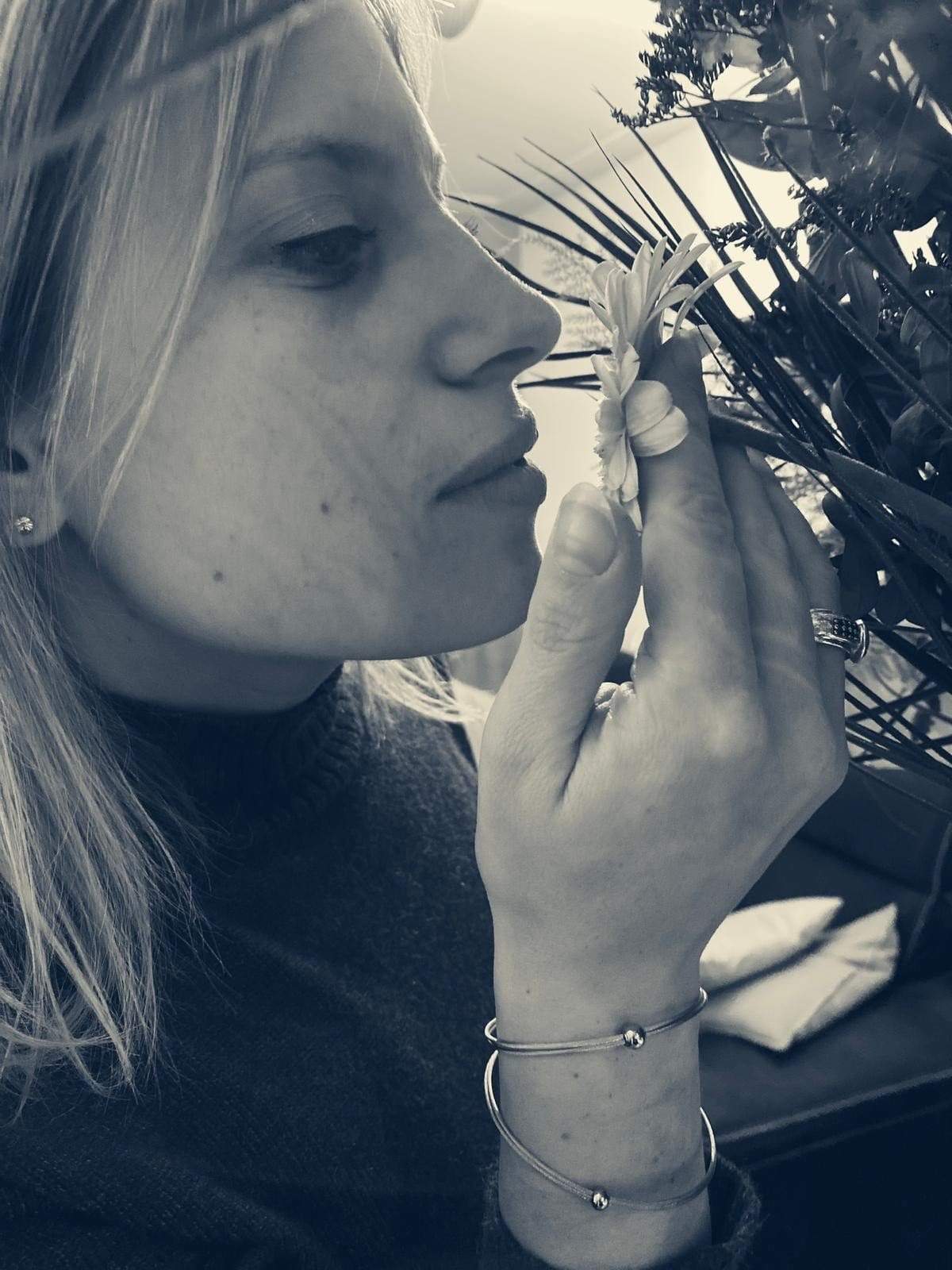 Woman wearing Thinking of You bracelet with bicolour bead | CLIC by Suzanne