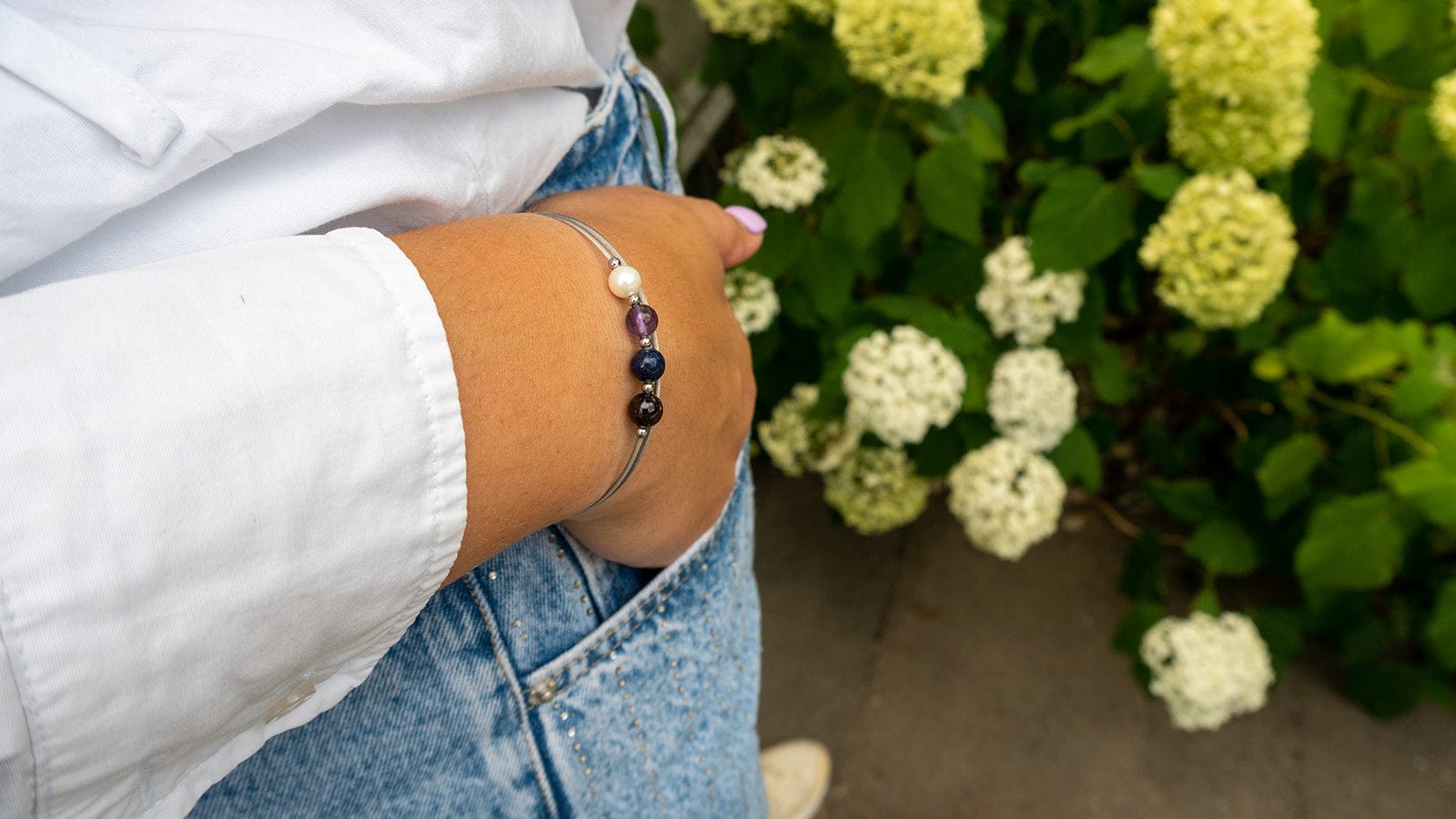 Stacked Thinking of You gemstone bracelets on the wrist | CLIC by Suzanne